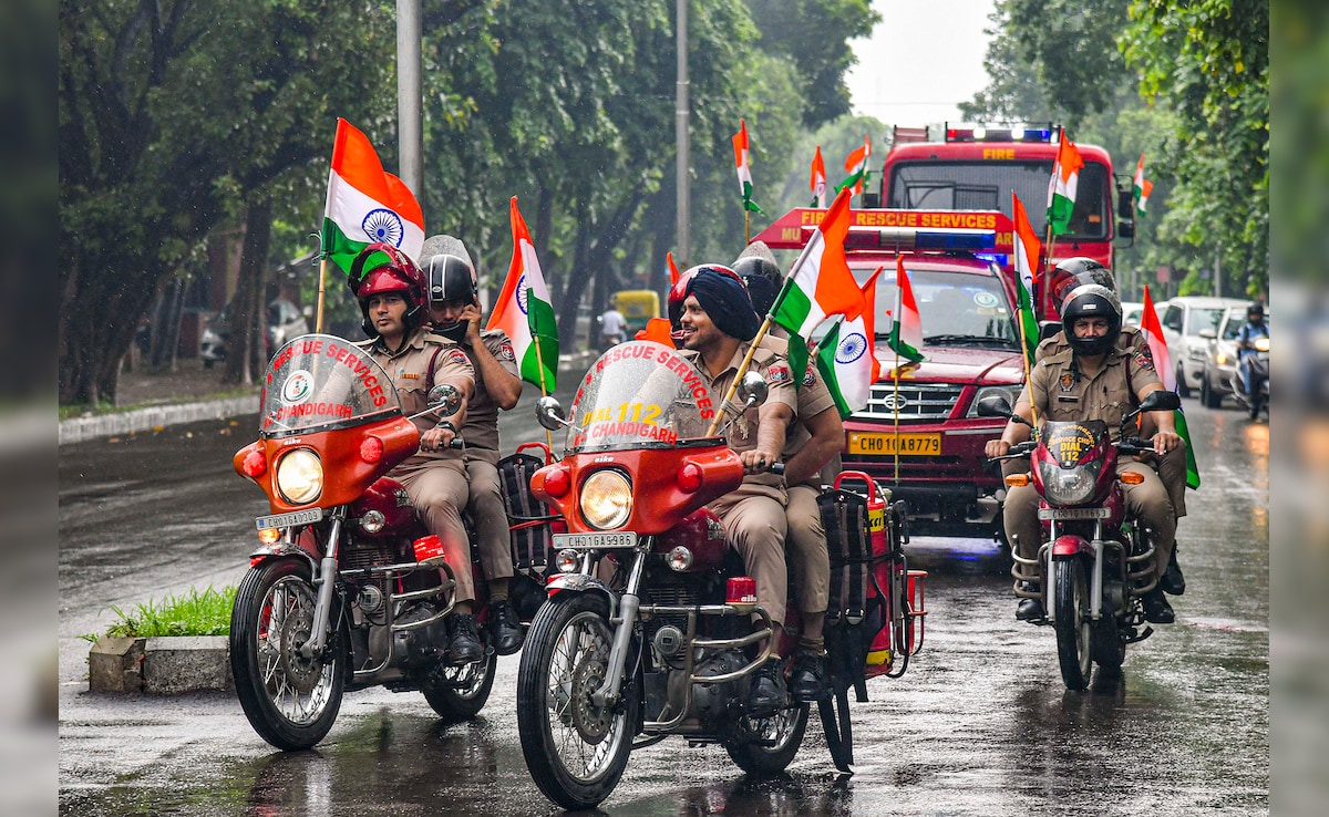 Fire department personnel take part in a rally under Har Ghar Tiranga campaign in Chandigarh