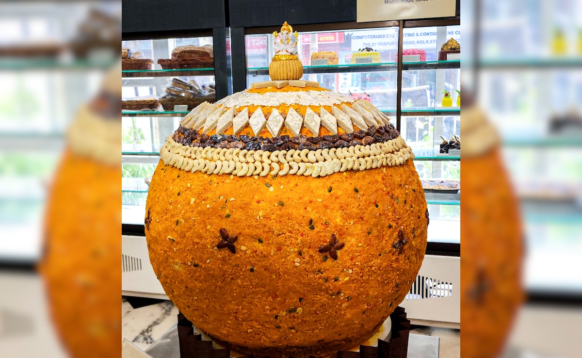 A colossal laddu weighing 500 kg displayed at a sweet shop on the occasion of Ganesh Chaturthi festival, in Kolkata